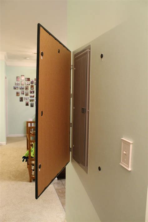 hanging mirror over electrical box|hang picture over breaker panel.